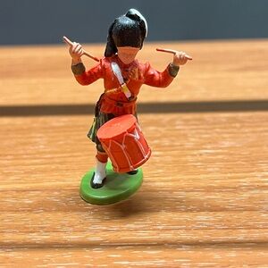 Source Unknown Drummer Action Figure - Red and Green